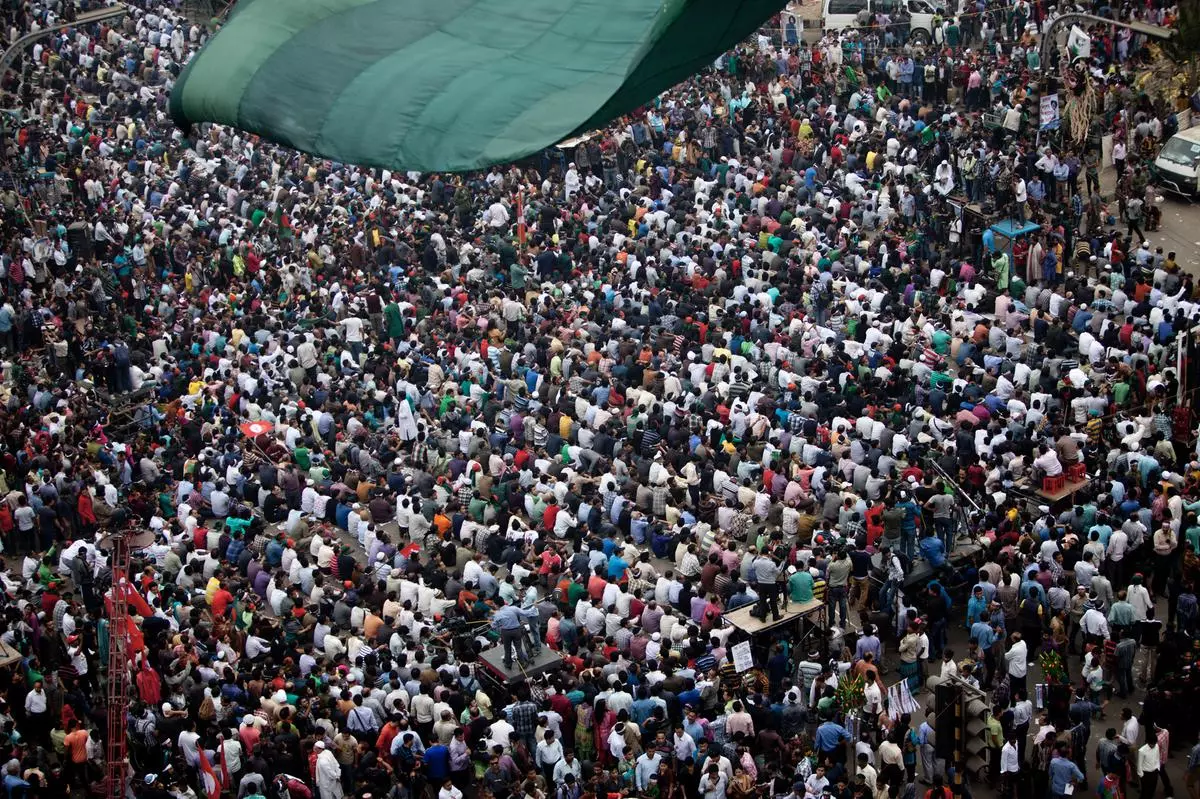 “Shahbagh square protest”, 2013, Dhaka.
Bloggers in Bangladesh initiated the Shahbagh movement, but were accused of being atheists by Islamic fundamentalist groups. One of the bloggers, Rajib, was murdered, while another, Asif, escaped with serious injuries. Here, Bangladeshis demanding the death sentence of people accused of crimes in the Liberation War of 1971, can be seen gathered at Shahbagh Square, a major traffic intersection in the heart of Dhaka.