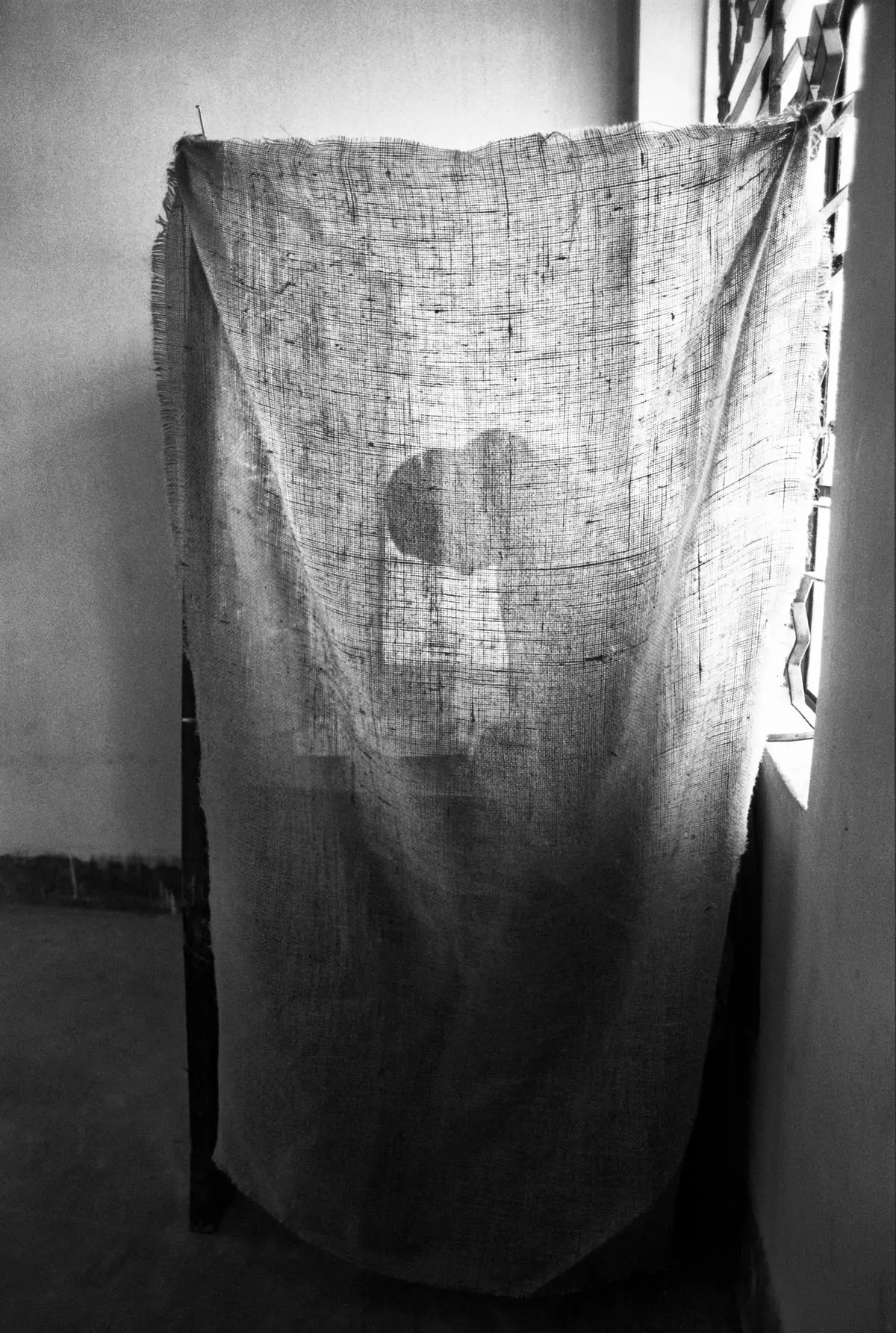 “Woman in ballot booth”, 1991, Dhaka. A woman at a makeshift election booth in Lalmatia, Dhaka, casts her vote after the removal of autocratic General Hussain Muhammad Ershad after a sustained people’s movement in 1990.