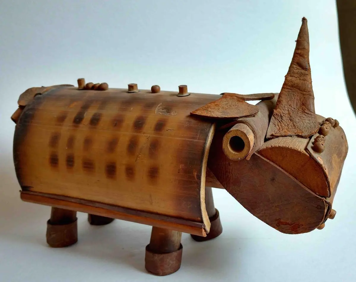 Rhino. Bamboo, wood and leather, 8.6 x 12.2 x 5.3 (22 x 31 x 13.5 cm.),
1962/63 -1979, Baroda. The toys were made for the Fine Arts Fair, MSU Baroda between 1962/63 and 1979. Rhino. Bamboo, wood and leather, 8.6 x 12.2 x 5.3 (22 x 31 x 13.5 cm.),
1962/63 -1979, Baroda. The toys were made for the Fine Arts Fair, MSU Baroda between 1962/63 and 1979.