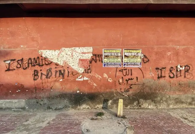 Graffiti on a college wall in downtown Srinagar in December 2022. Graffiti on a college wall in downtown Srinagar in December 2022.