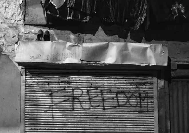 “Freedom” written on a shop shutter in Srinagar’s Habba Kadal in December 2022. “Freedom” written on a shop shutter in Srinagar’s Habba Kadal in December 2022.