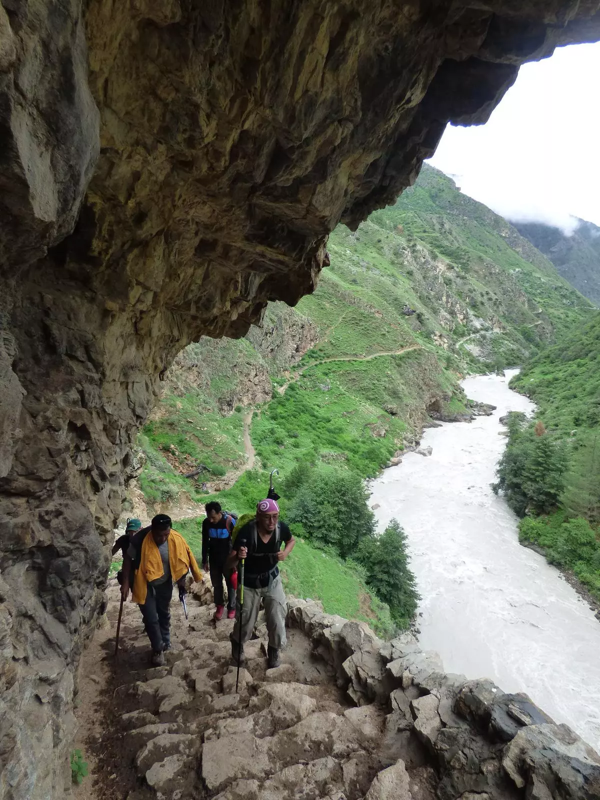 Our team hiking up the old trail along the Humla Karnali river. Humla district in west Nepal is one of the highest and most remote regions of the country.