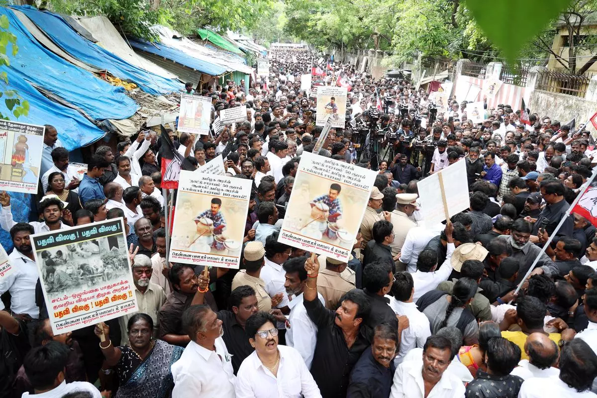 AIADMK supporters protest against the Tamil Nadu government over alleged sale of illicit liquor in the state, in Chennai on June 24.