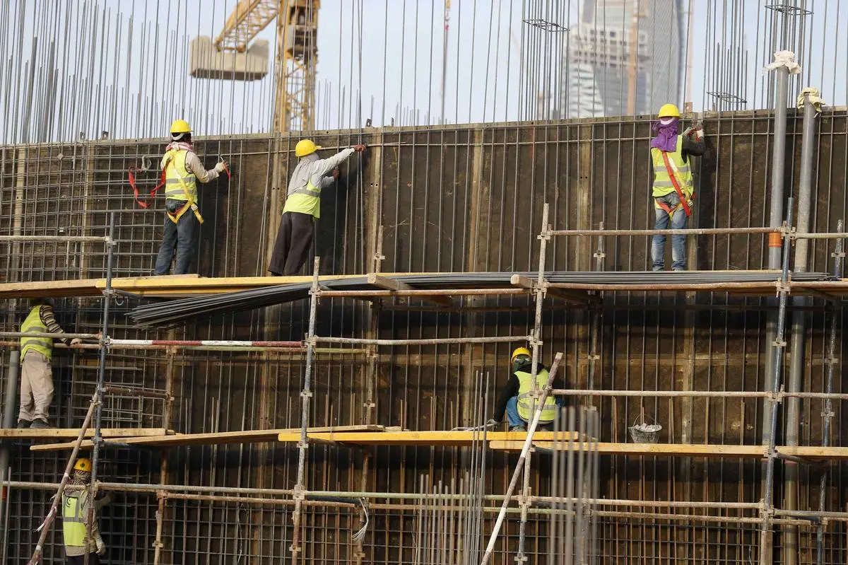 Indian labourers at the construction site of a building in Riyadh, on November 16, 2014. 