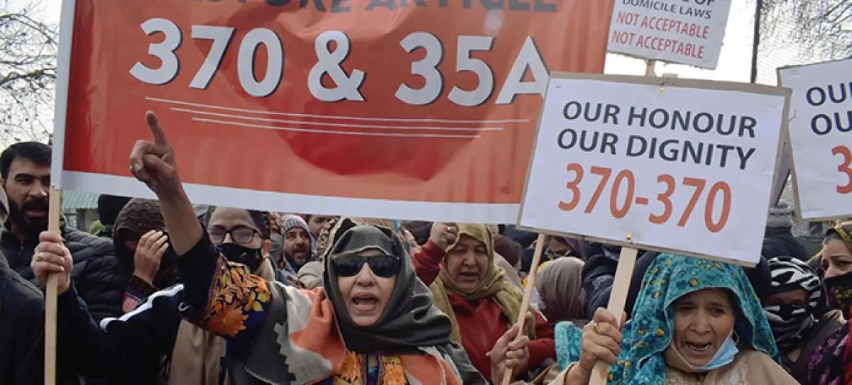 National Conference workers protest against a draft proposal of the Jammu and Kashmir Delimitation commission in Srinagar on January 1, 2022. Sagar says the Omar Abdullah-led government views statehood as the first step before taking up further demands related to Article 370 and special protections for land and jobs.