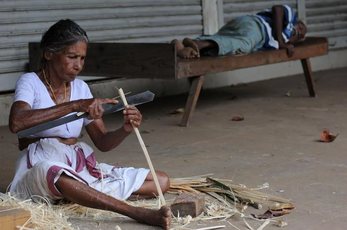 Ammu, who was 80 when this photograph was taken in 2016, working her craft as a bamboo artisan at Mattumantha in suburban Palakkad. With inadequate support structure, many elderly people are forced to go on working for a living.  