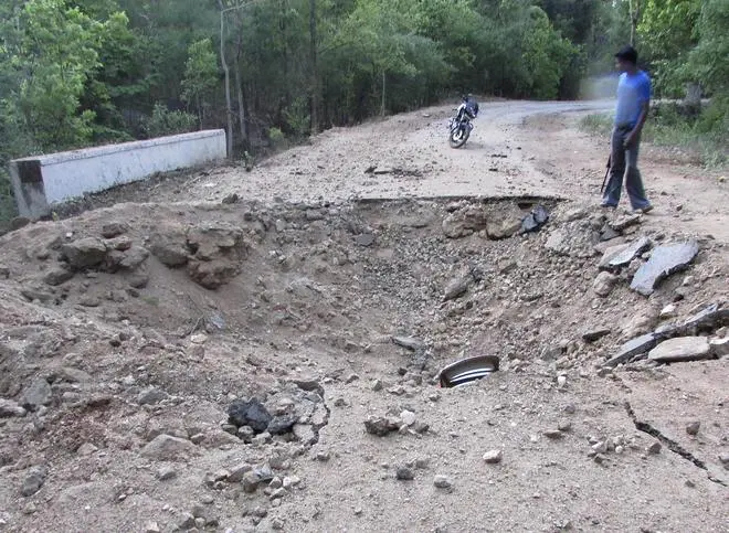After a Maoist land mine attack in a densely forested area in Bastar, about 345 km south of Raipur, on May 26, 2013. After a Maoist land mine attack in a densely forested area in Bastar, about 345 km south of Raipur, on May 26, 2013.