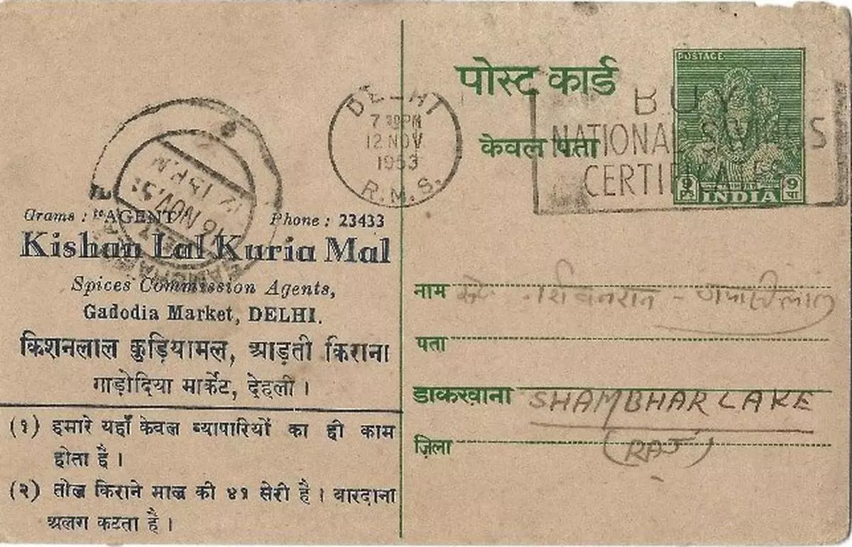 A postcard mailed from Delhi to Sambhar Lake in 1953 featuring the slogan Buy National Savings Certificates 