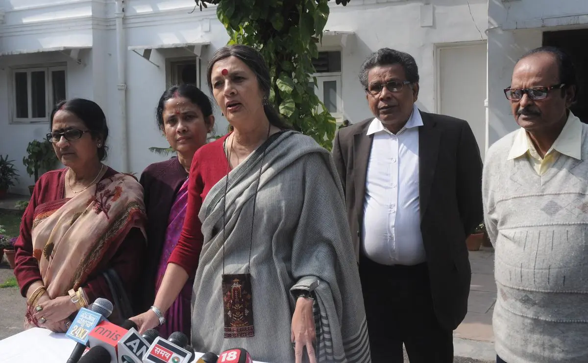 Brinda Karat with Sagarika Chakraborty’s parents in February 2012 after meeting ex-External Affairs Minister, S.M. Krishna, at his residence, in New Delhi.