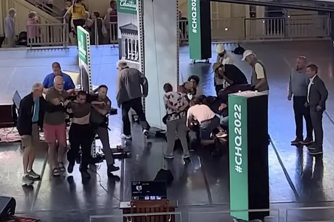 This still image from a video shows Hadi Matar, 24, of Fairview, New Jersey (at left) being escorted from the stage as people tend to Salman Rushdie (centre right), at the Chautauqua Institution, in Chautauqua, New York on August 12. This still image from a video shows Hadi Matar, 24, of Fairview, New Jersey (at left) being escorted from the stage as people tend to Salman Rushdie (centre right), at the Chautauqua Institution, in Chautauqua, New York on August 12.