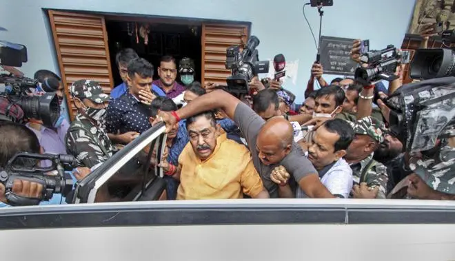 Trinamool Congress leader Anubrata Mandal after his arrest by the CBI in connection with a cattle smuggling case, at Bolpur in Birbhum, on August 11. His arrest has hit the party at the organisational level. Trinamool Congress leader Anubrata Mandal after his arrest by the CBI in connection with a cattle smuggling case, at Bolpur in Birbhum, on August 11. His arrest has hit the party at the organisational level.