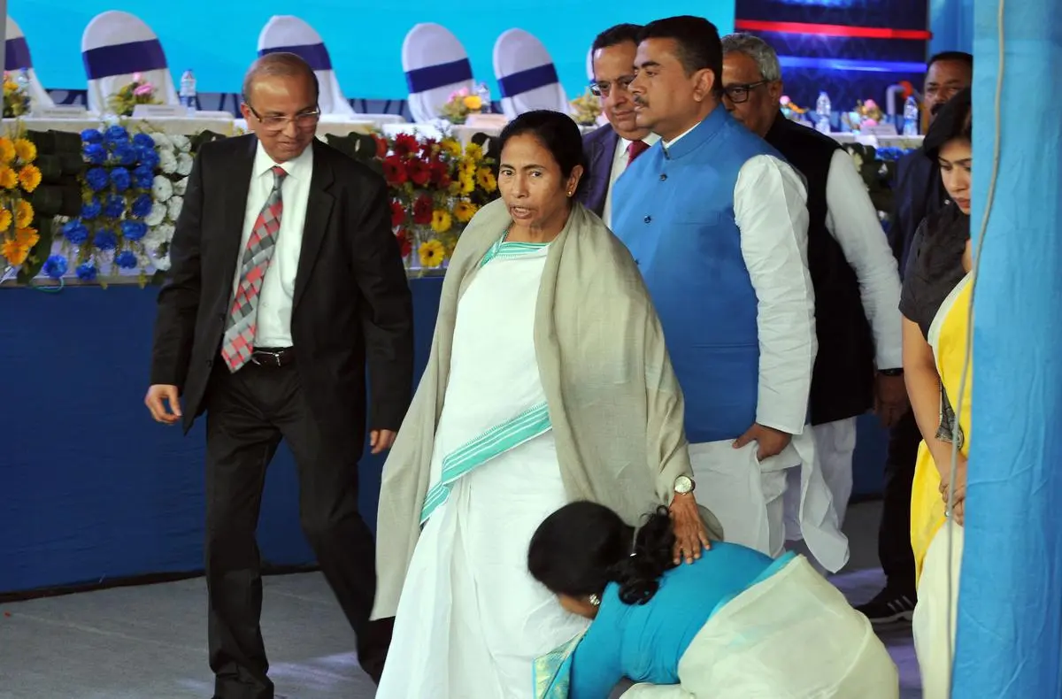 West Bengal Chief Minister Mamata Banerjee with Transport Minister Suvendu Adhikari at the inauguration of the Punched Grid Battery factory in Haldia, Purba Medinipur, on January 2, 2017.