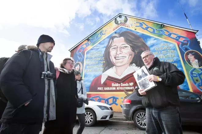 The mural memorialising the IRA hunger striker Bobby Sands. The 27-year-old Sands was elected as a Member of Parliament in 1981 while still in prison and on hunger strike against the removal of Special Category Status for Northern Ireland prisoners incarcerated for their deeds during The Troubles. Less than a month after his election, Sands died, on Day 66 of his hunger strike. 