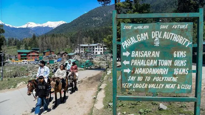 Tourists take a pony ride at Pahalgam town on the eve of Pahalgam terror attack's first anniversary, in Anantnag, on April 21, 2026. Tourists take a pony ride at Pahalgam town on the eve of Pahalgam terror attack's first anniversary, in Anantnag, on April 21, 2026.