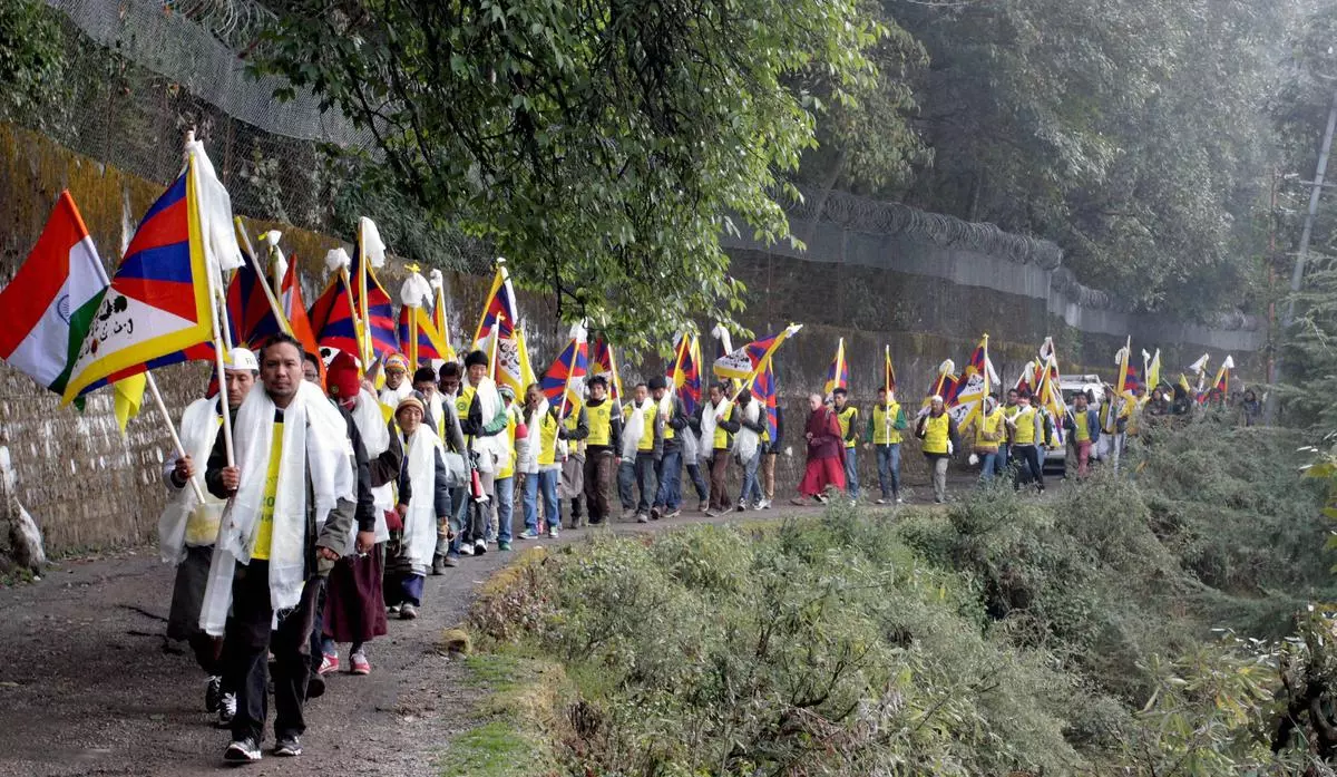 De jeunes Tibétains participent à la marche du soulèvement tibétain à Mcleodganj, Dharamshala, en 2014. 