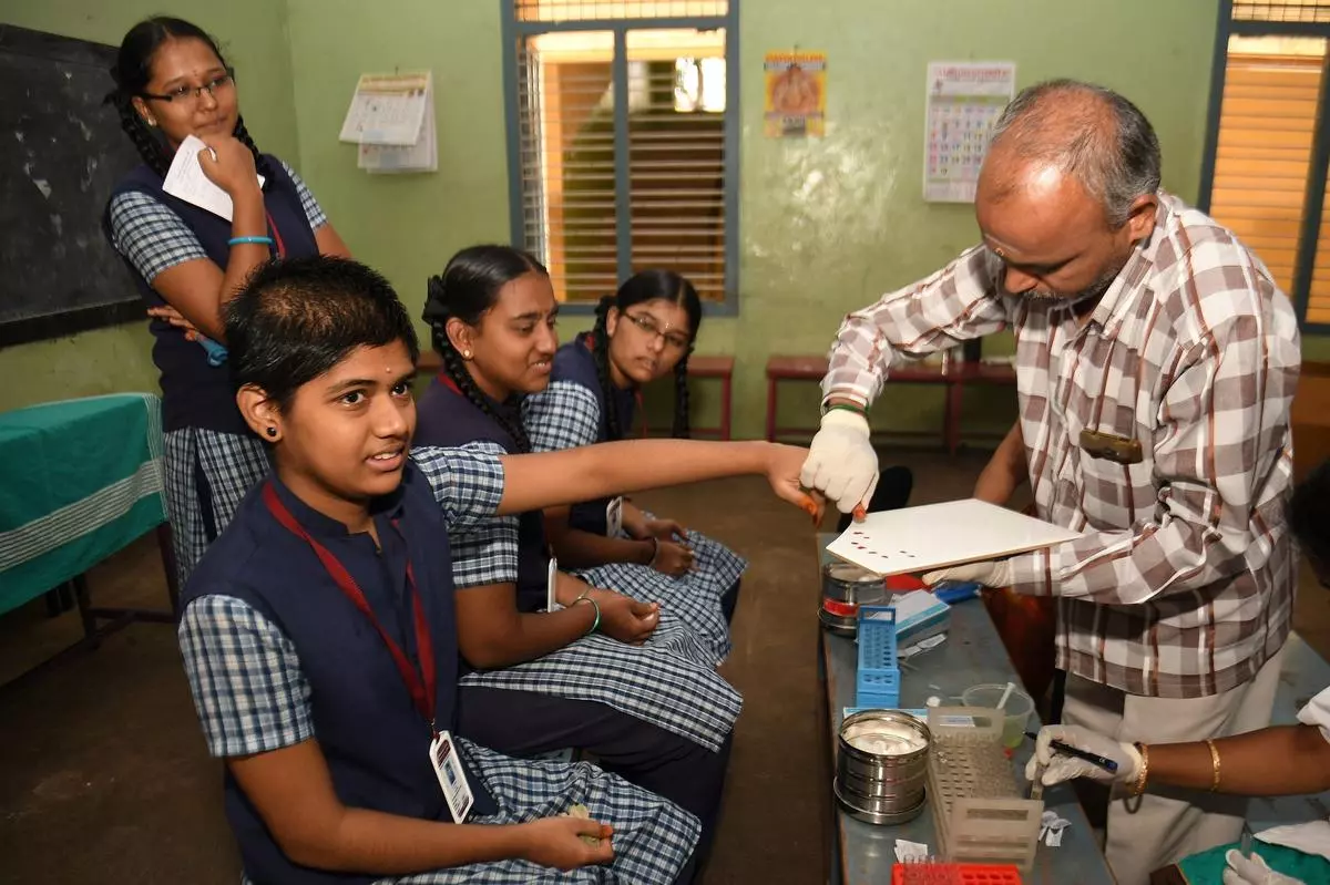 Students being checked for anaemia as part of the medical camp conducted at Government Girls Higher Secondary School under the Poshan Abhiyaan programme, in Salem, Tamil Nadu.  