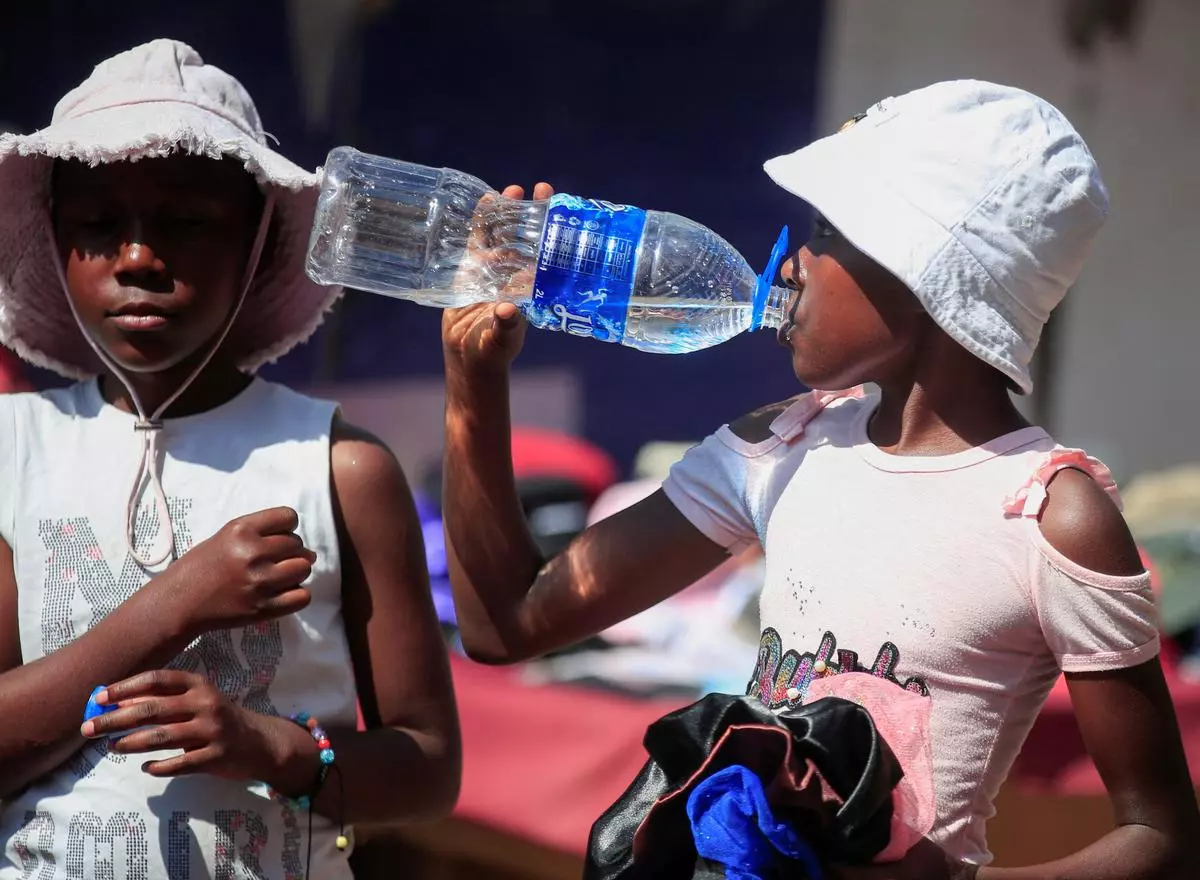 In 2023, children and adults over 65 experienced 13.8 days of heatwaves, which set a new per-person record. Here, in the capital of Zimbabwe, Harare, in December 2024. The country is in the midst of a heatwave.