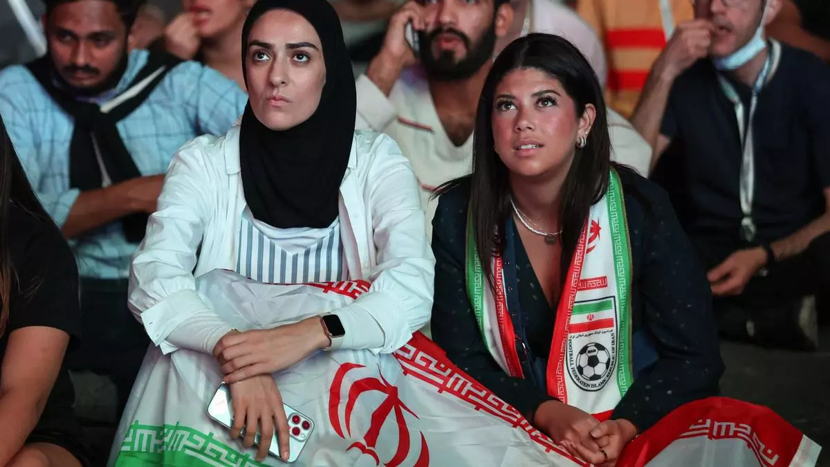 Barred from men's soccer games at home, Iranian women flock to World Cup in  Qatar