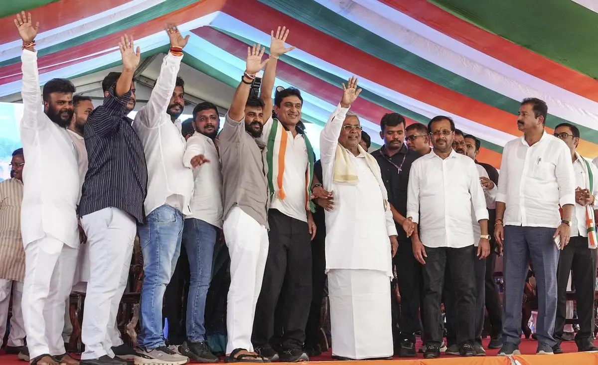 Karnataka Chief Minister Siddaramaiah with IYC National President Uday Bhanu Chib, State Youth Congress president H.S. Manjunatha, and others during a protest over alleged irregularities in the NEET-UG medical entrance exam, at Freedom Park in Bengaluru on May 21, 2026.