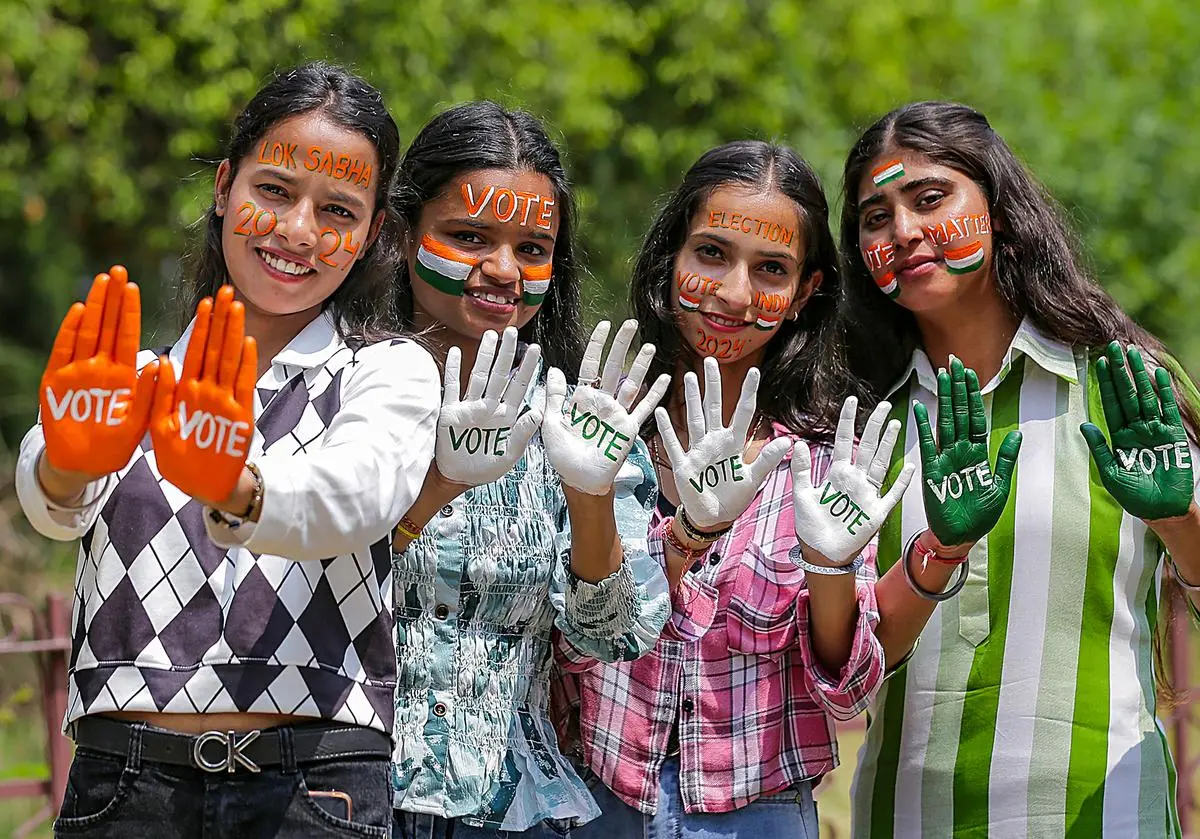 Girls with their faces and hands painted to encourage people to vote ahead of the Lok Sabha election, in Amritsar on April 14. Girls with their faces and hands painted to encourage people to vote ahead of the Lok Sabha election, in Amritsar on April 14.