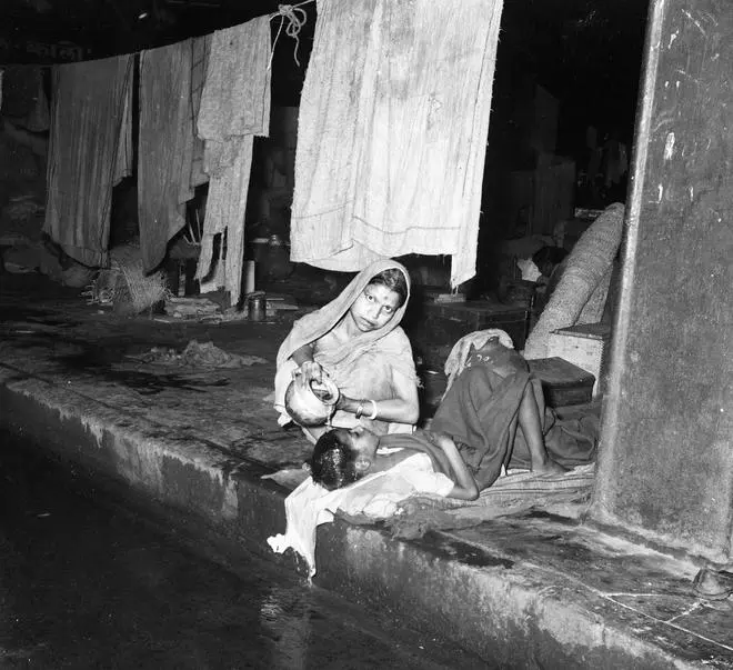 Refugee camps, mass housing schemes, and job opportunities were bound by caste barriers. Most Dalit-Bahujan refugees ended up getting menial jobs like sweepers in the municipality or peons in government offices. This March 1953 picture shows refugees living in Howrah station, Calcutta, after deserting camps in Bihar and Orissa, long after Partition. Refugee camps, mass housing schemes, and job opportunities were bound by caste barriers. Most Dalit-Bahujan refugees ended up getting menial jobs like sweepers in the municipality or peons in government offices. This March 1953 picture shows refugees living in Howrah station, Calcutta, after deserting camps in Bihar and Orissa, long after Partition.
