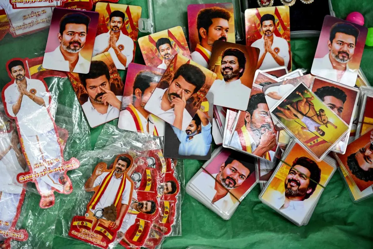 A vendor selling pictures of Indian actor and Tamilaga Vettri Kazhagam leader C. Joseph Vijay during the vote counting for the Tamil Nadu Legislative Assembly elections at the party headquarters, in Chennai, on May 4, 2026.