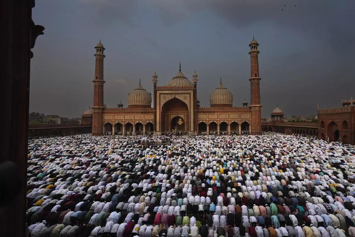 Muslims offer prayers at a mosque in New Delhi. The report states that minority populations (Muslim, in particular) have been growing in non-Muslim-majority countries. 