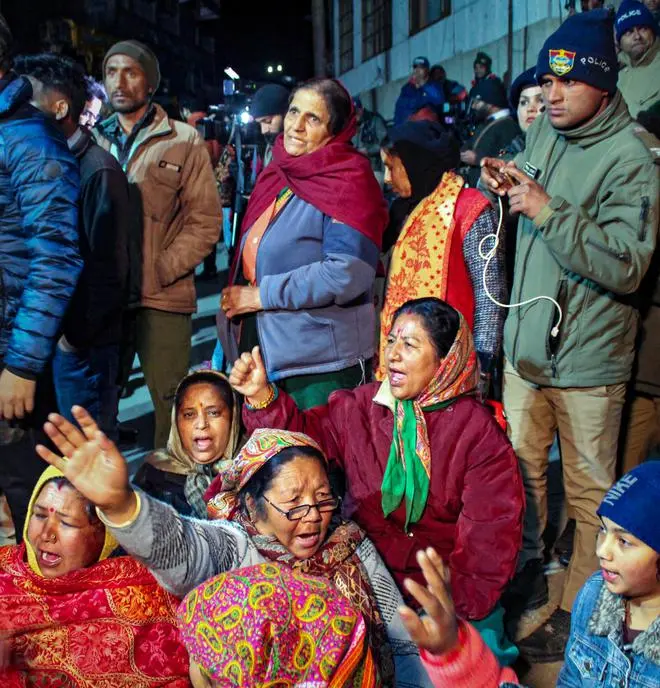 Residents protesting against the demolition of unsafe hotels and houses, in Joshimath on January 10, 2023. Residents protesting against the demolition of unsafe hotels and houses, in Joshimath on January 10, 2023.