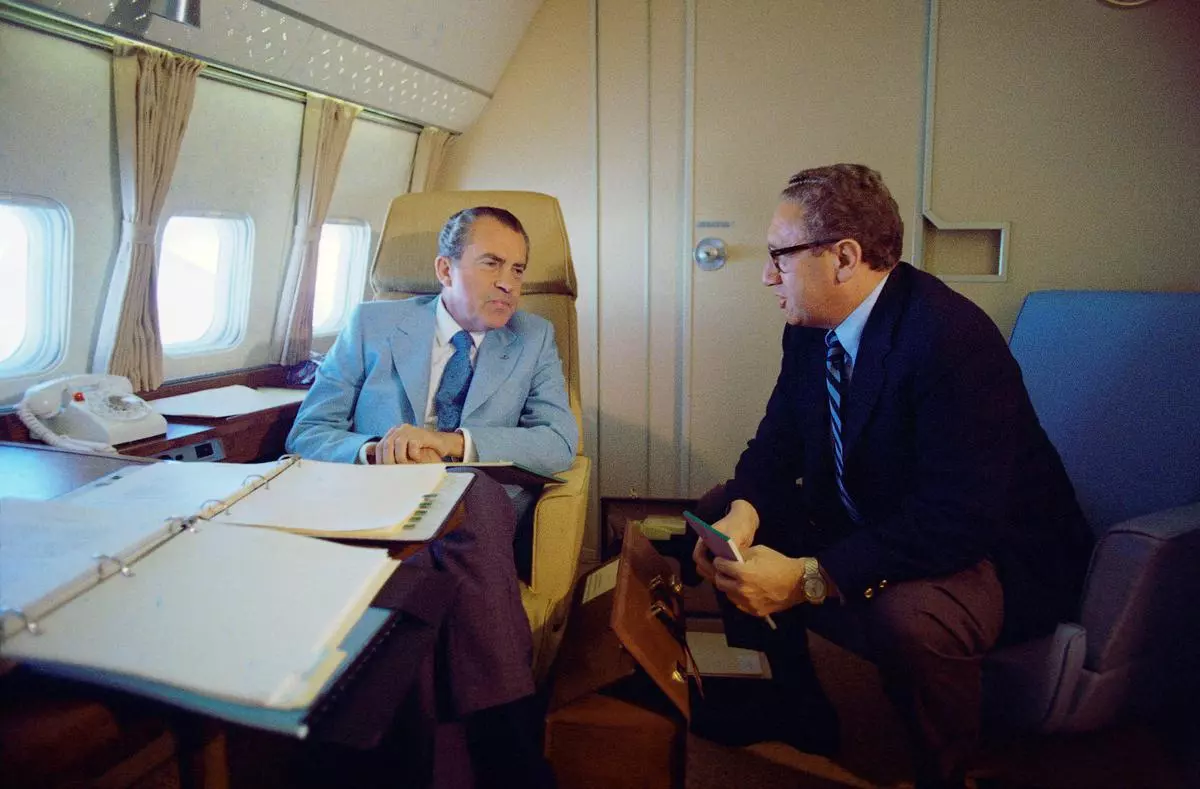 US President Richard Nixon and National Security Adviser Henry Kissinger on Air Force One during their voyage to China on February 20, 1972.