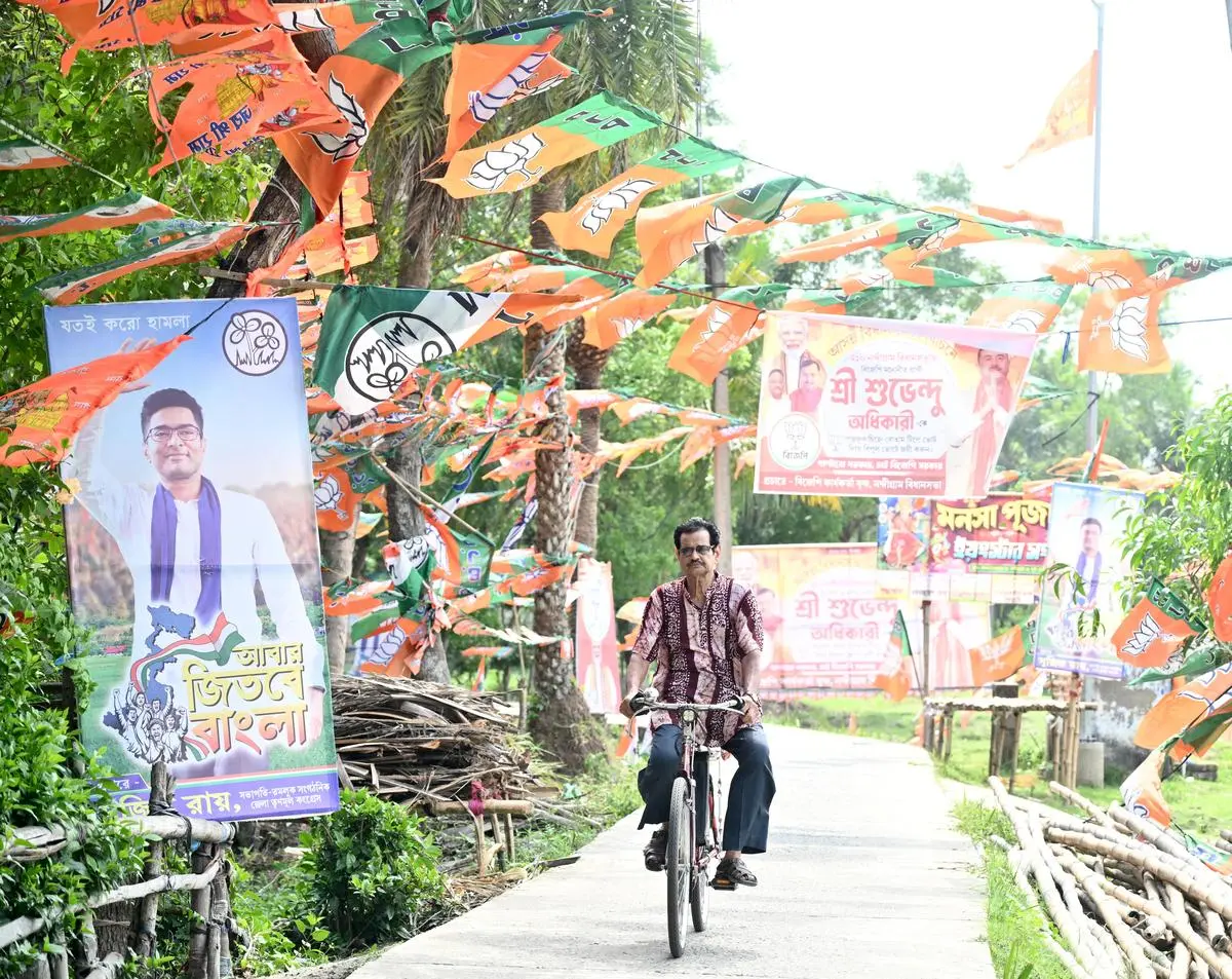 A man leaves after casting his vote during Phase 1 voting in Nandigram, West Bengal, on April 23, 2026.