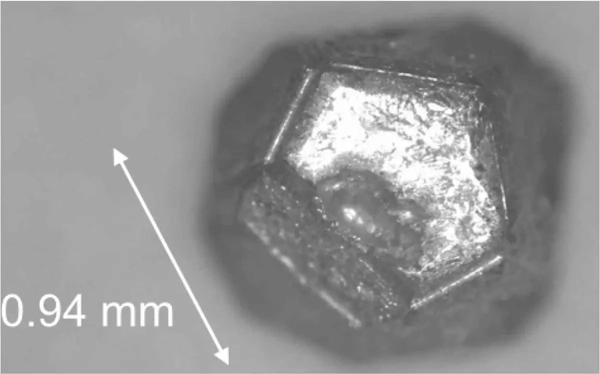 Single grains of a scandium-zinc quasicrystal have 12 pentagonal faces. Single grains of a scandium-zinc quasicrystal have 12 pentagonal faces.