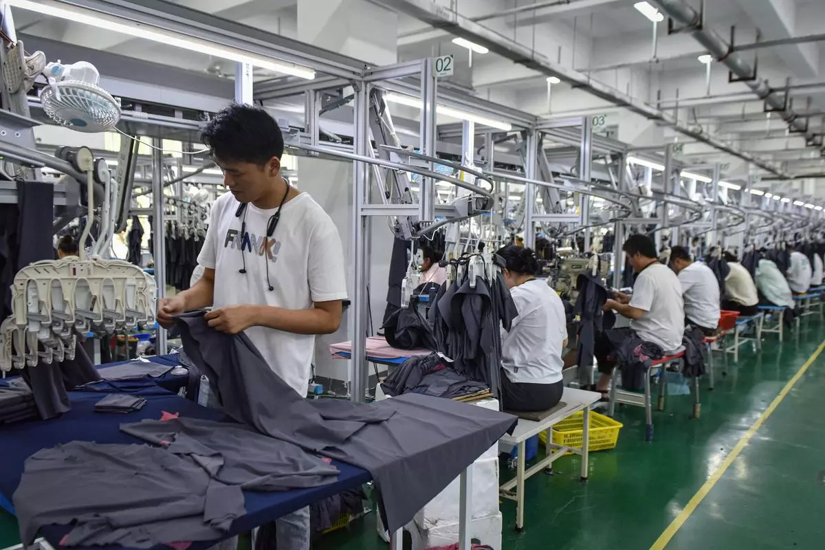 At a sun protection clothing factory in Fuyang in eastern China’s Anhui province. China requires a big boost to its economy, and it sees Europe as an advanced market for its “new quality productive forces” and as a source of technological collaboration to climb the global value chain. 