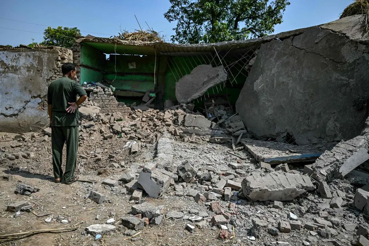 Outside a house damaged by Pakistani artillery shelling in Kotmaira village near the LoC in Jammu on May 11. Pakistan has a long history of shelling areas near the LoC, even during periods of relative calm. Outside a house damaged by Pakistani artillery shelling in Kotmaira village near the LoC in Jammu on May 11. Pakistan has a long history of shelling areas near the LoC, even during periods of relative calm.