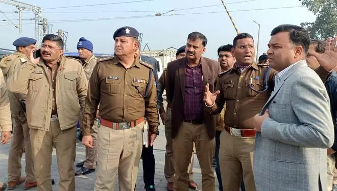 Police officers inspect the site during the eviction of people from railway land in Haldwani, Uttarakhand on Jan. 4, 2023. (PTI Photo) Police officers inspect the site during the eviction of people from railway land in Haldwani, Uttarakhand on Jan. 4, 2023. (PTI Photo)
