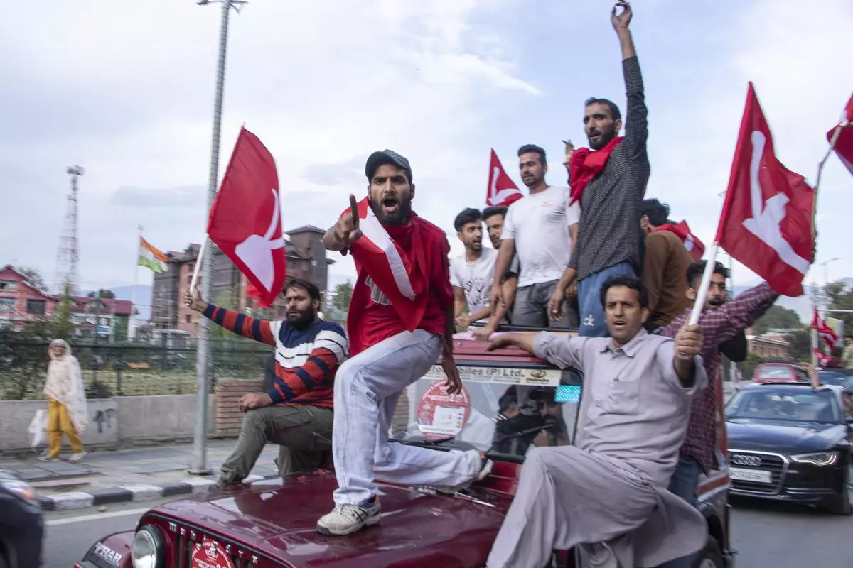 JKNC supporters at a rally to celebrate after the Congress-National Conference alliance secured 49 seats, winning the Assembly election, in Srinagar.