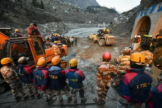 Rescue operations under way at the Tapovan Tunnel after a glacier broke off in Joshimath, causing a massive flood in the Dhauliganga river, in February 2021. Rescue operations under way at the Tapovan Tunnel after a glacier broke off in Joshimath, causing a massive flood in the Dhauliganga river, in February 2021.