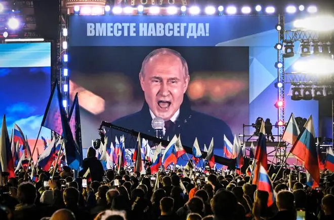 Vladimir Putin is seen on a screen at Moscow’s Red Square as he addresses a rally on September 30. His speech was an all-out attack on Western imperialism. Vladimir Putin is seen on a screen at Moscow’s Red Square as he addresses a rally on September 30. His speech was an all-out attack on Western imperialism.