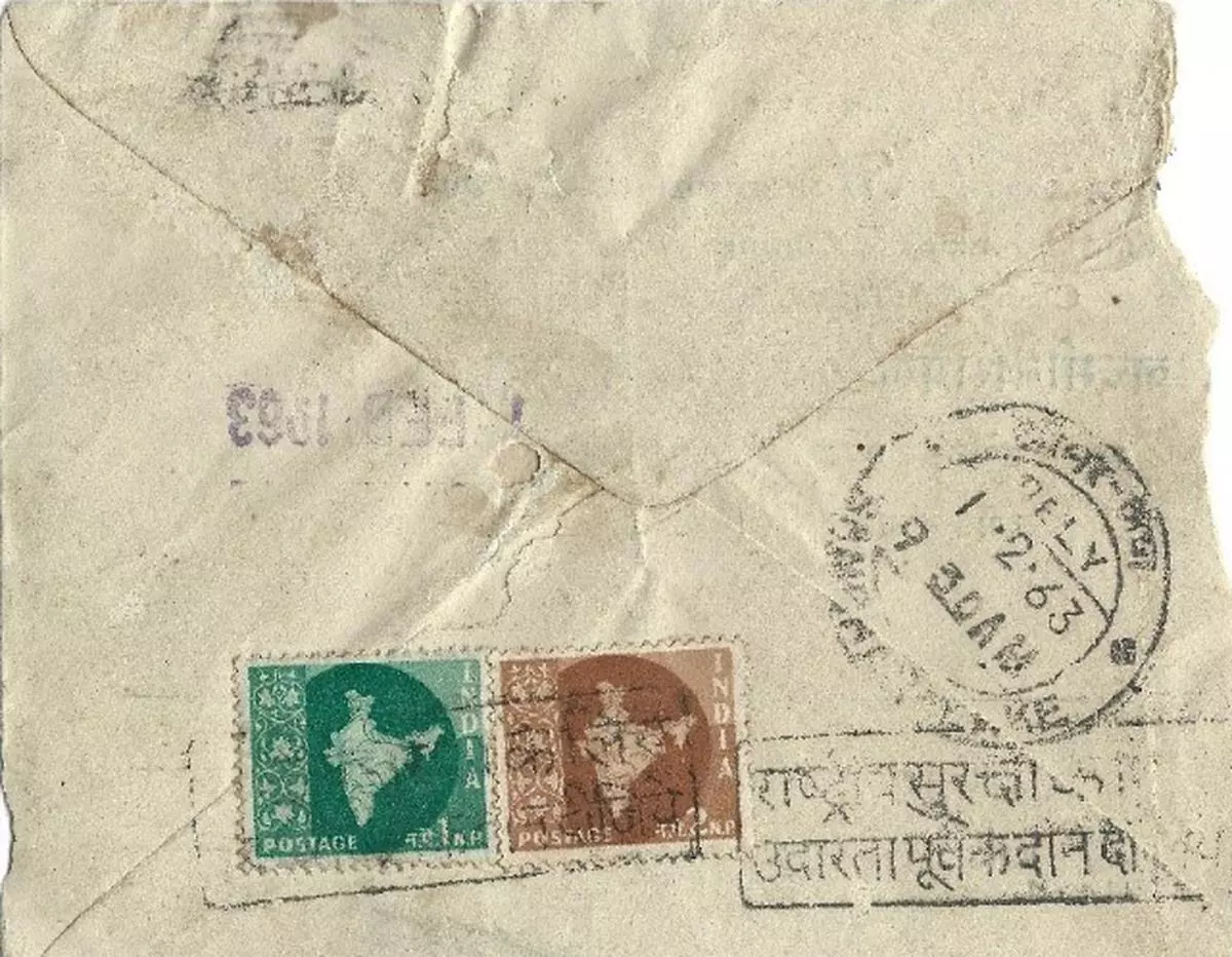 An envelope mailed from Jaipur to Sambhar Lake in 1963 featuring the message Contribute Generously for National Security affixed at both the dispatch as well delivery post offices.