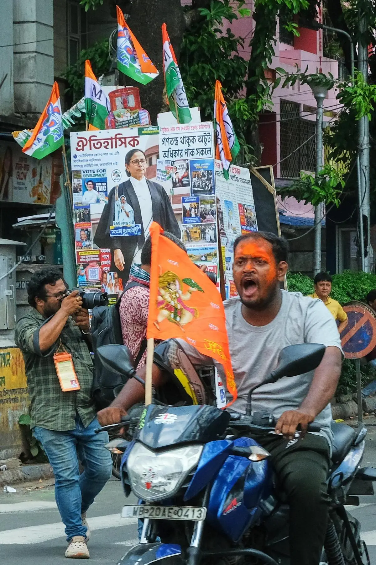 A BJP supporter celebrating the party's early lead in the election, in Kolkata on May 4, 2026.