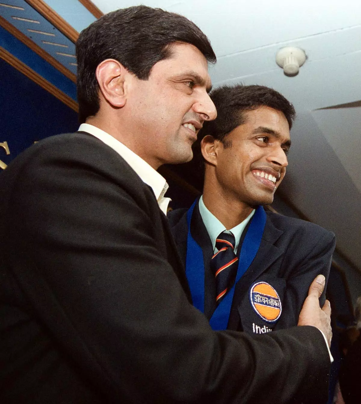 Pullela Gopi Chand being hugged by Prakash Padukone for becoming the second Indian to win the All England Championships in 2001, in New Delhi on March 14, 2001.