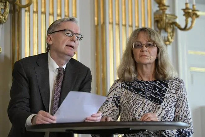 Chairman of the Committee for Literature, Anders Olsson, and member of the Nobel Prize Committee for Literature, Ellen Mattson, speak during the announcement of the 2022 Nobel Prize in Literature, in Borshuset, Stockholm, Sweden, on October 6. Chairman of the Committee for Literature, Anders Olsson, and member of the Nobel Prize Committee for Literature, Ellen Mattson, speak during the announcement of the 2022 Nobel Prize in Literature, in Borshuset, Stockholm, Sweden, on October 6.