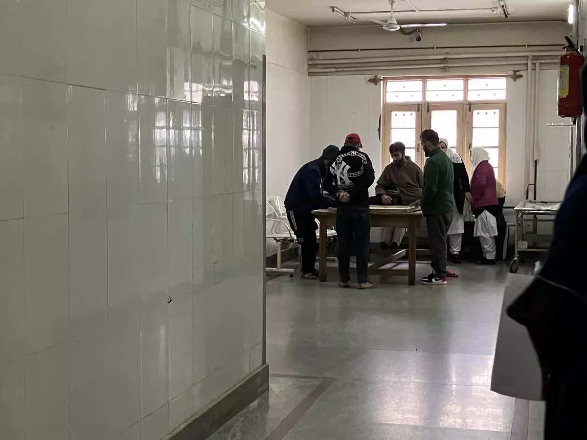 A group of boys play carrom inside the de-addiction centre at the Shri Maharaja Hari Singh Hospital in Srinagar, Kashmir.