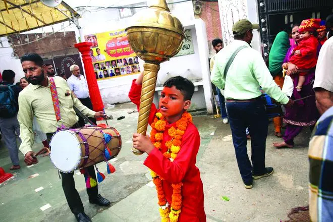 Playing Hanuman with a heavy mace while dancing to the beat. Playing Hanuman with a heavy mace while dancing to the beat.