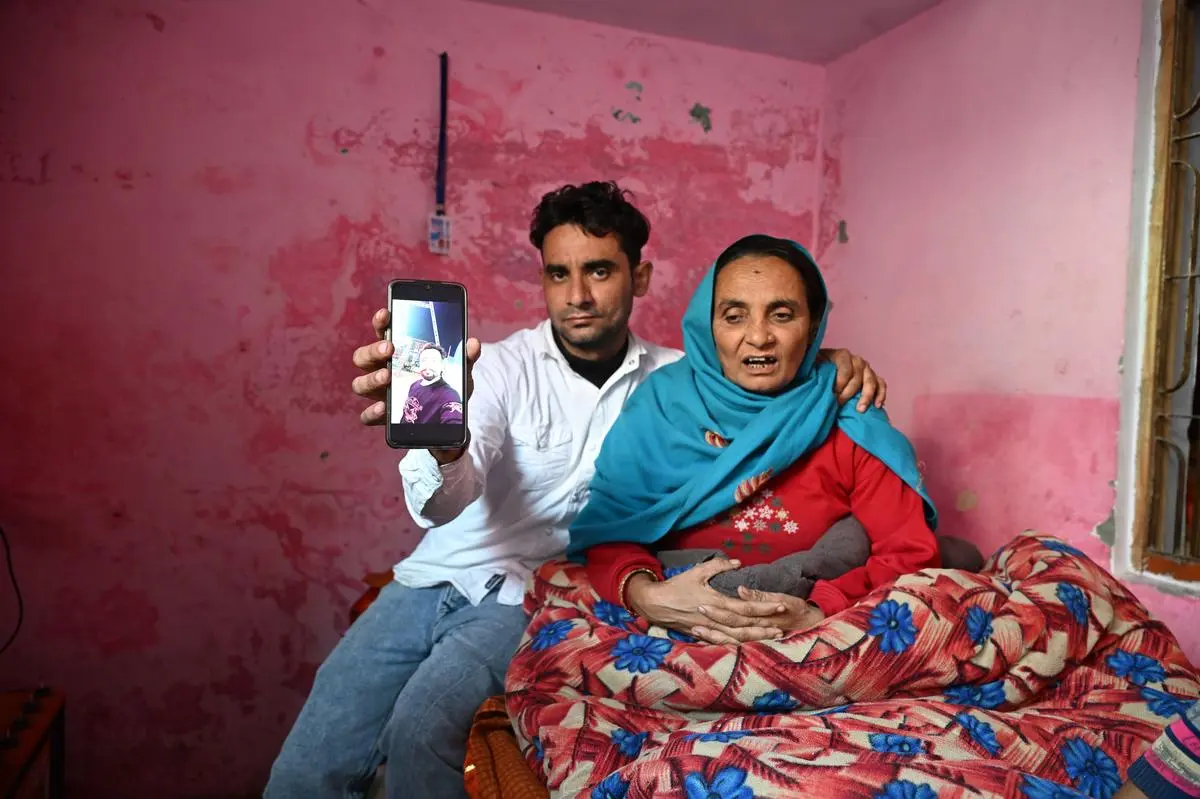 Family members of Naeem, who was killed in the Sambhal violence. 