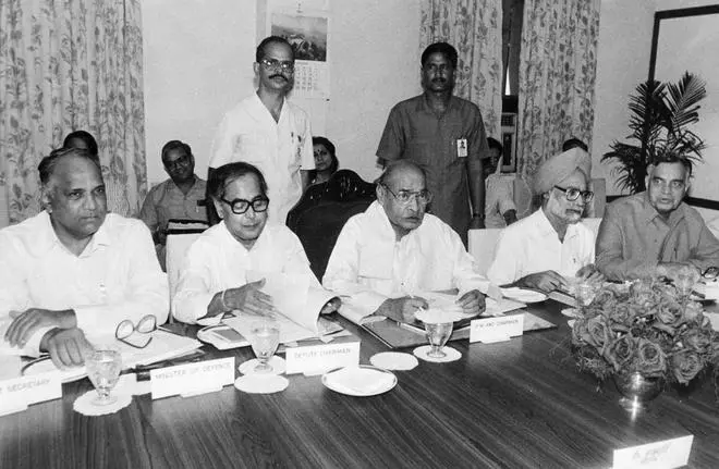 At a meeting of the Planning Commission on September 19, 1991, Prime Minister P.V. Narasimha Rao (centre) with Defence Minister Sharad Pawar, Planning Commission Deputy Chairman Pranab Mukherjee, Finance Minister Manmohan Singh and Agriculture Minister Balram Jakhar. At a meeting of the Planning Commission on September 19, 1991, Prime Minister P.V. Narasimha Rao (centre) with Defence Minister Sharad Pawar, Planning Commission Deputy Chairman Pranab Mukherjee, Finance Minister Manmohan Singh and Agriculture Minister Balram Jakhar.