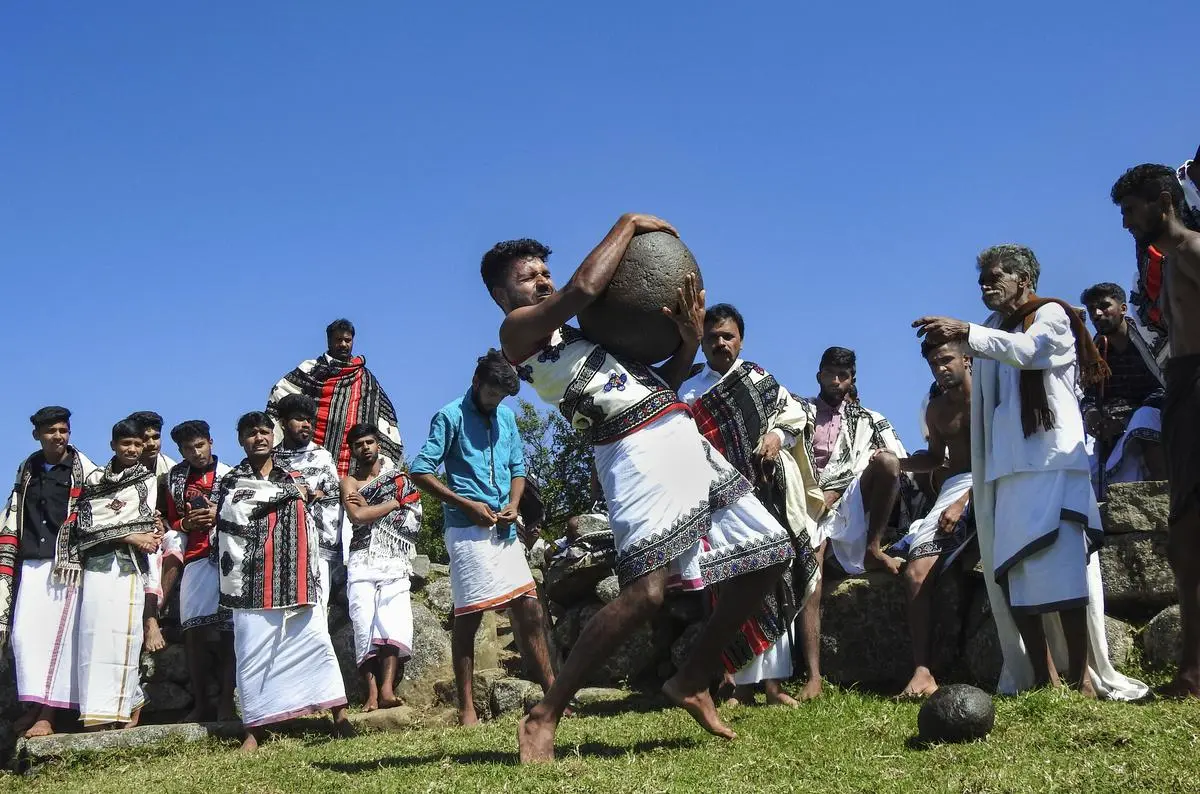 The Toda community takes part in a ritual to welcome the New Year in Nilgiris district, Tamil Nadu. The Toda community takes part in a ritual to welcome the New Year in Nilgiris district, Tamil Nadu.