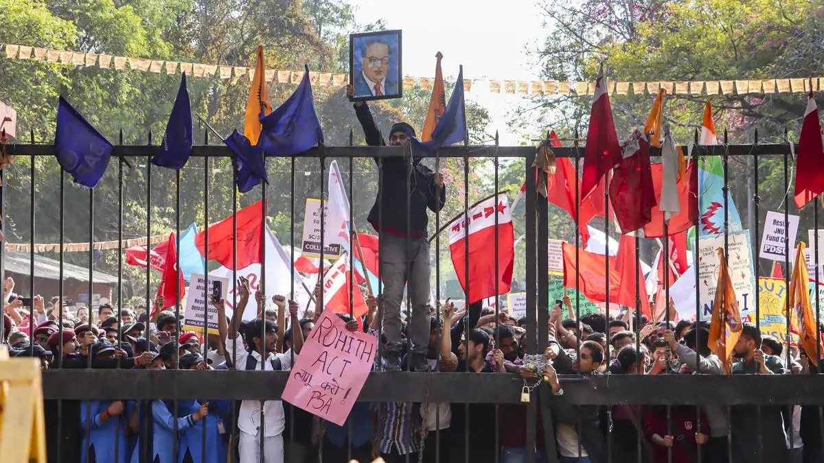Why were JNU students arrested during a march to the Ministry of Education?