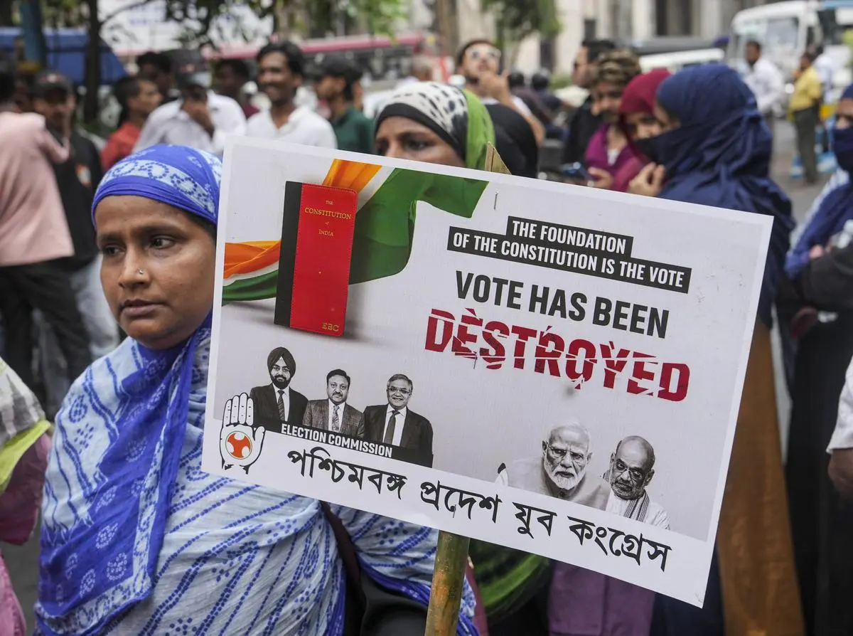 At a protest over the alleged “vote chori” and against the Special Intensive Revision of electoral rolls in Bihar, in Kolkata on August 12.