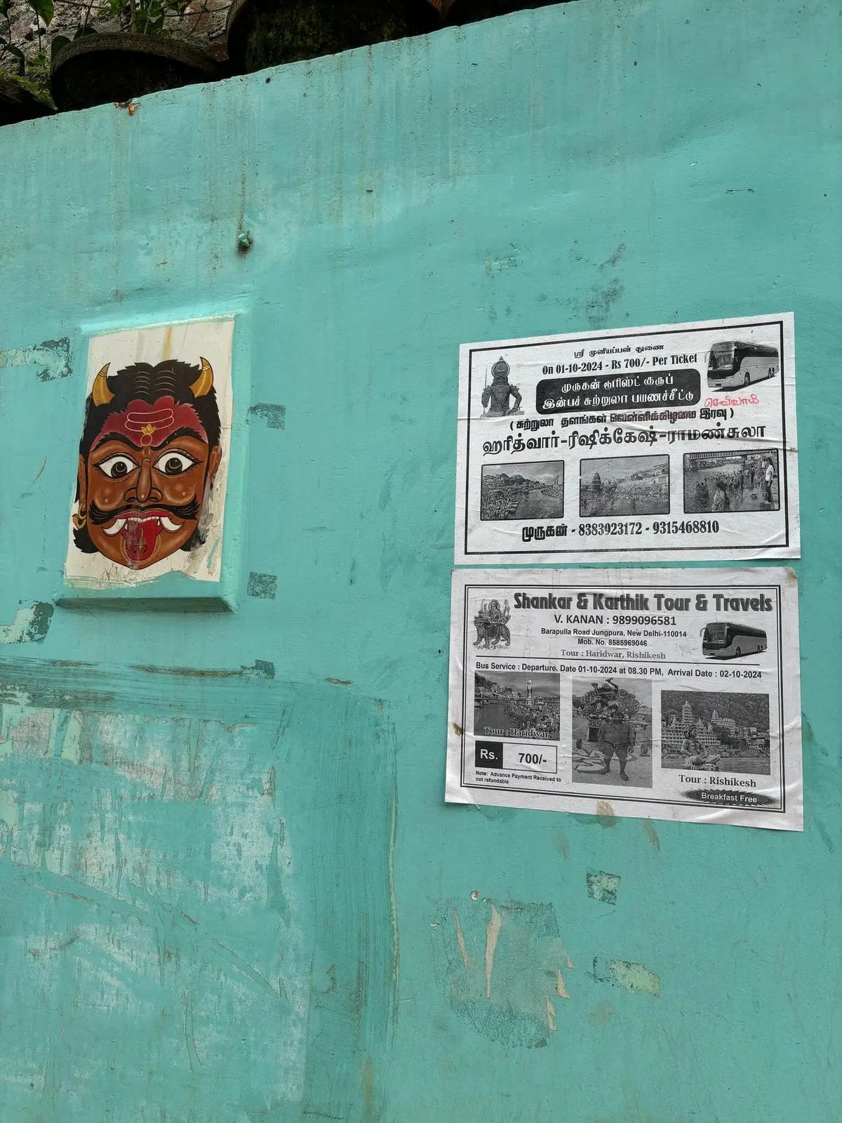 A blend of cultural iconography and bilingual advertisements catering to the Tamil-speaking population of the camp. A blend of cultural iconography and bilingual advertisements catering to the Tamil-speaking population of the camp.