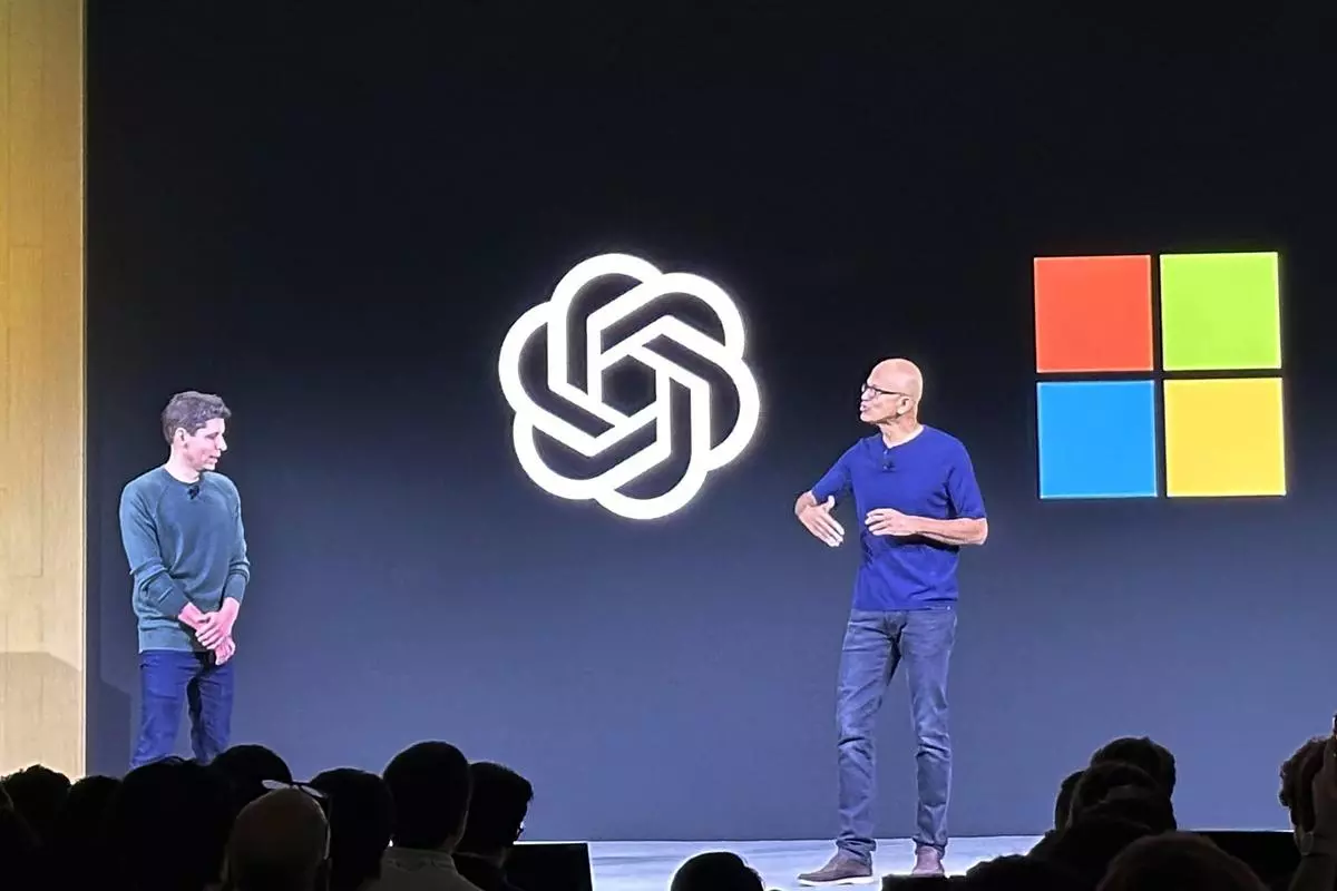 Sam Altman (left), CEO of OpenAI, appears onstage with Microsoft CEO Satya Nadella at OpenAI DevDay, OpenAI’s first developer conference, on November 6 in San Francisco.